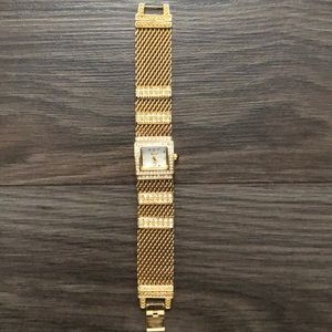 Gold watch, with stones in band, from Vivah